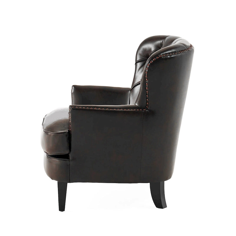 Fauteuil club capitonné en cuir marron surdimensionné