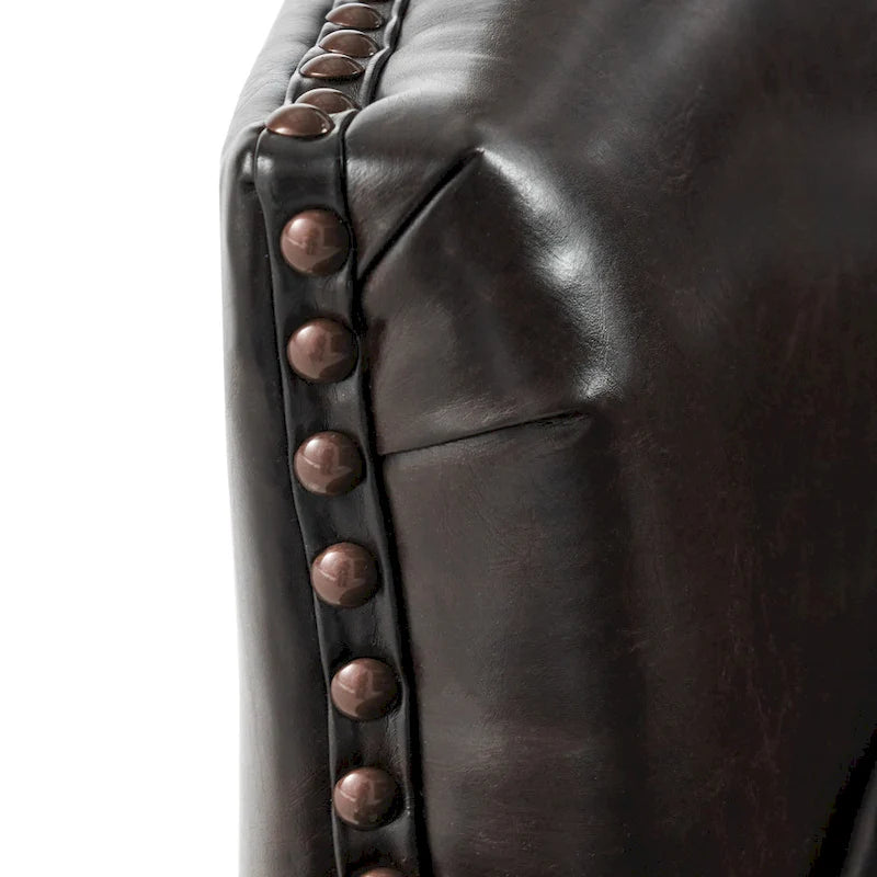 Fauteuil club capitonné en cuir marron surdimensionné